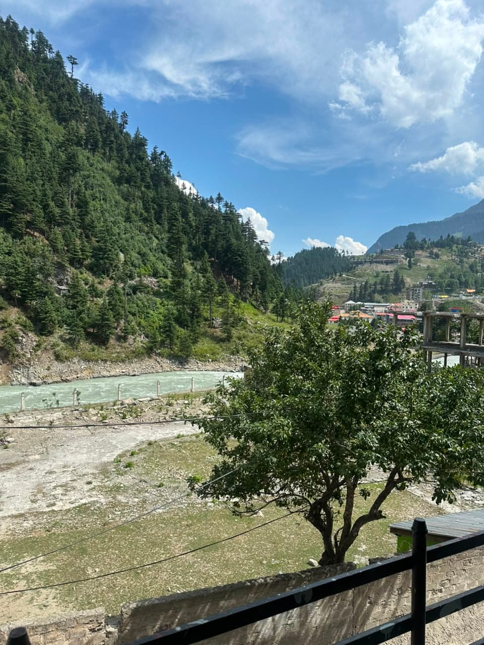 Green Kalam valley with turquoise river and pine forests